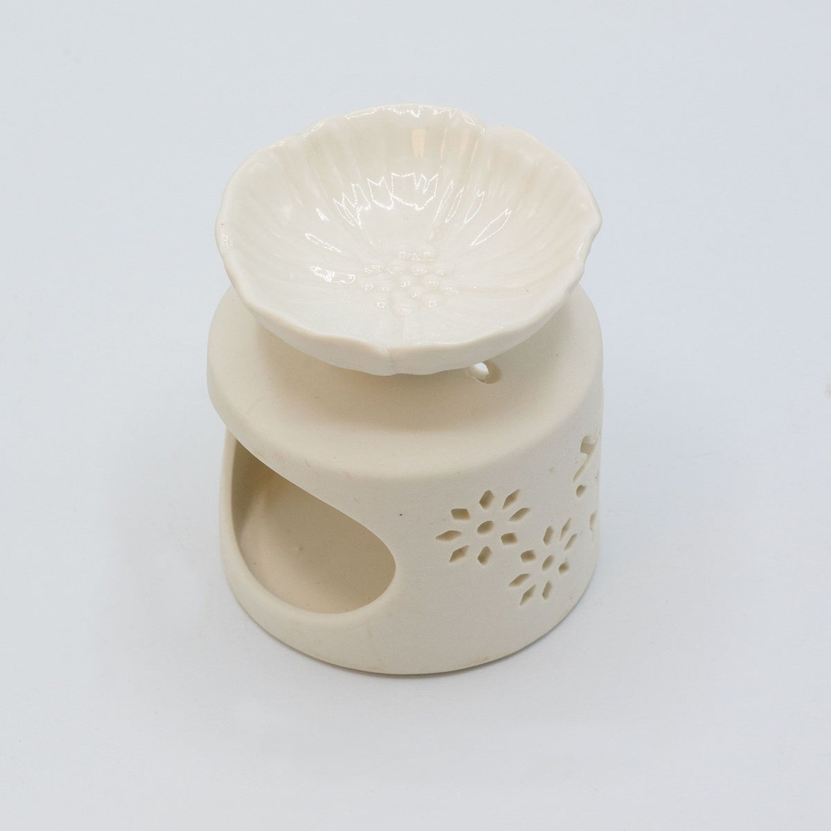Quemador de aceites de ceramica · Blanco floral