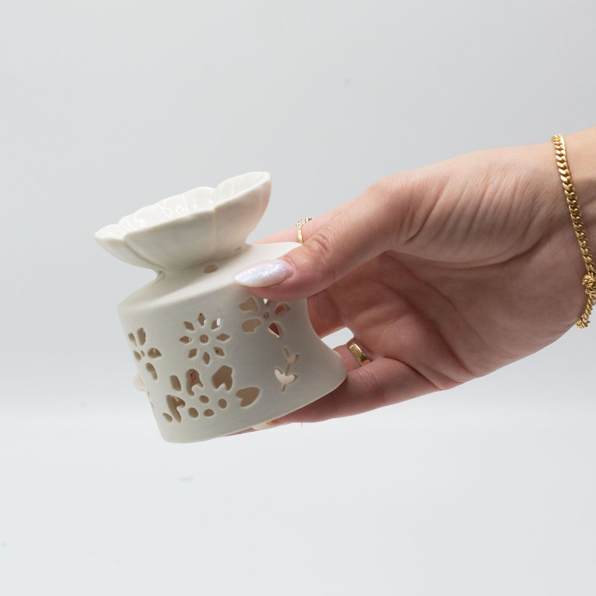 Quemador de aceites de ceramica · Blanco floral